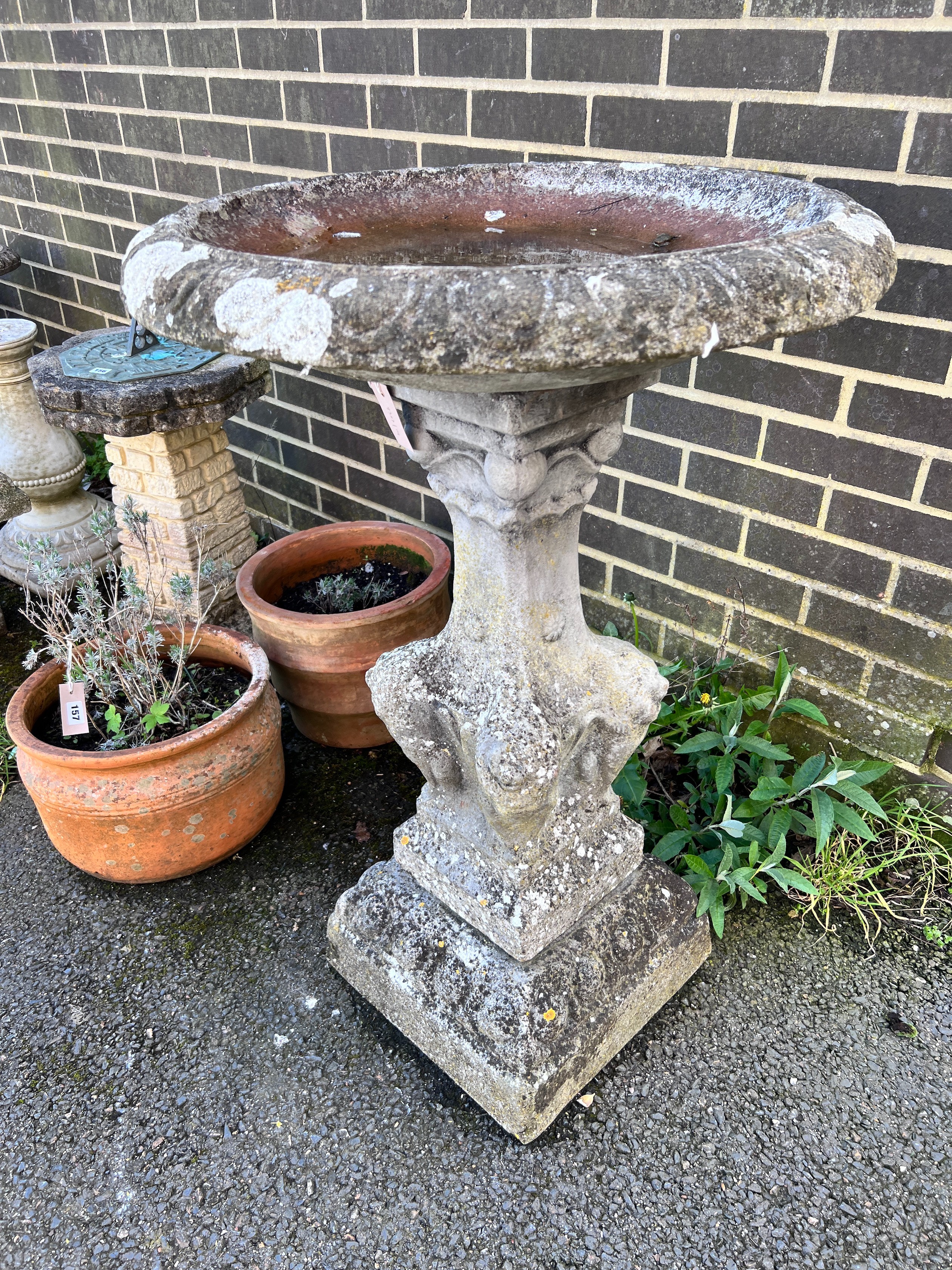 A circular reconstituted stone bird bath, diameter 65cm, height 94cm *Please note the sale commences at 9am.